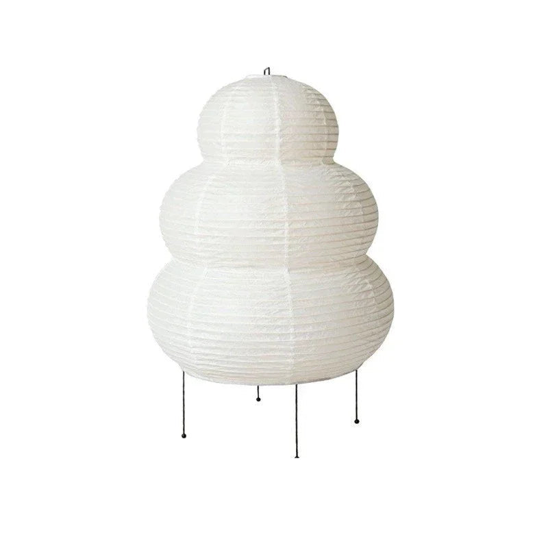 Modern floor lamp with a cloud-like design in a living room setting.