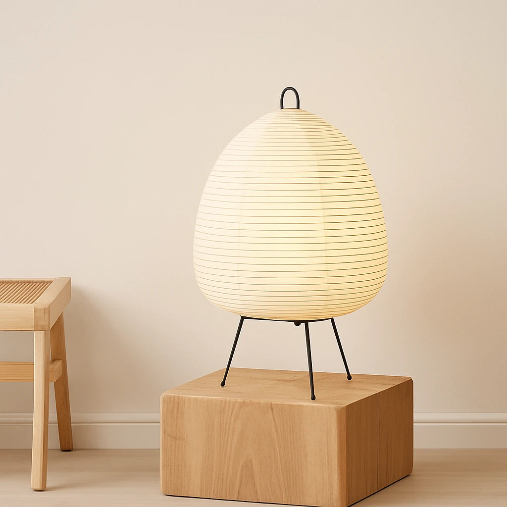 LUMMERO™ Japanese rice paper lantern table lamp on wooden base, warm light, minimalist beige interior.