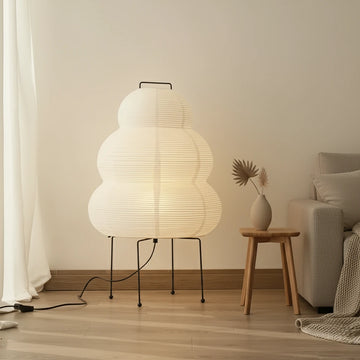 Modern floor lamp with a cloud-like design in a living room setting.